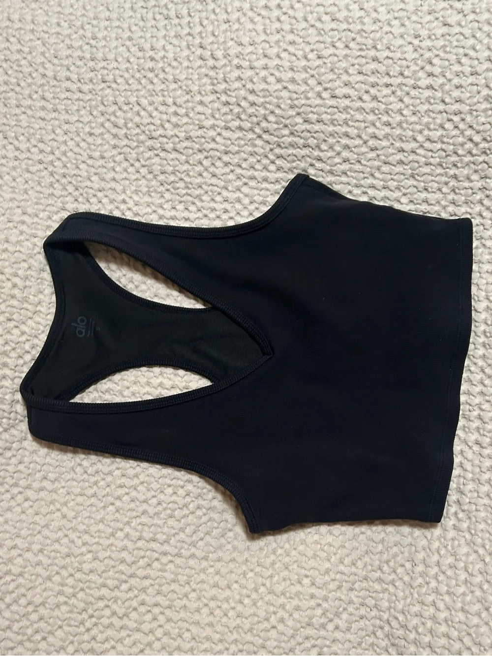 ALO Goddess Ribbed Cropped Racerback Tank in Black